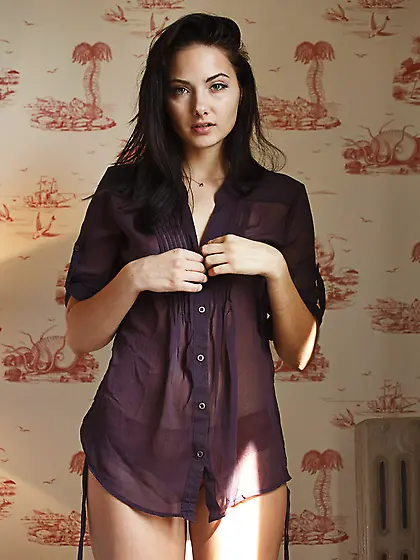 Small-tit brunette poses red