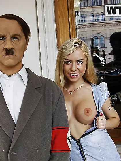 Isabella Clark poses with Hitler before fucking a hard cock