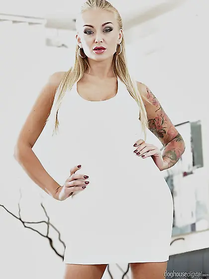 Blonde whore with big fake tits and tattoos makes men fantasize