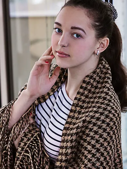 Beautiful chick bares tits and then slips off jeans and panties