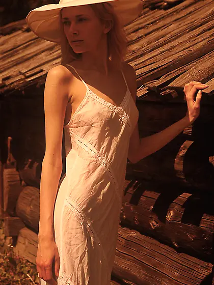 Olya M goes for a walk every morning to get a perfect tan and to