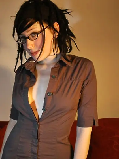 Girl with glasses exposes her natural boobies and slowly pulls t