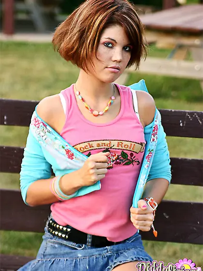 Cute teen model Diddylicious takes off her mini skirt and shows