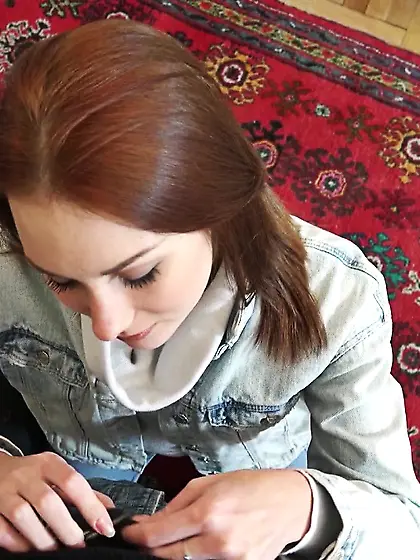 This smoking-hot redhead babe is getting fucked hard.