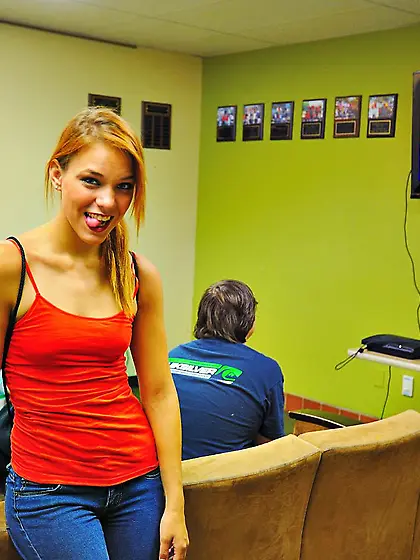 Naughty teen redhead Daisy Dalton knows how to tease the guys wi