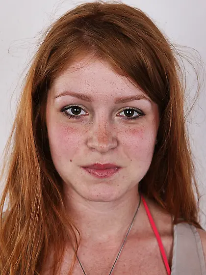 Cute redhead wearing orange