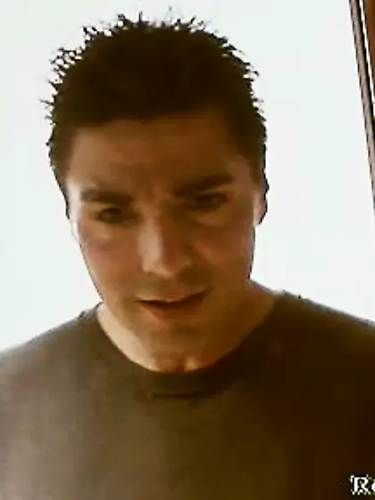 Eyeing camera sensually grips