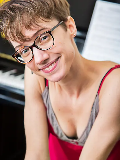 Thin geek with boyish hair shows her hairy muff up close