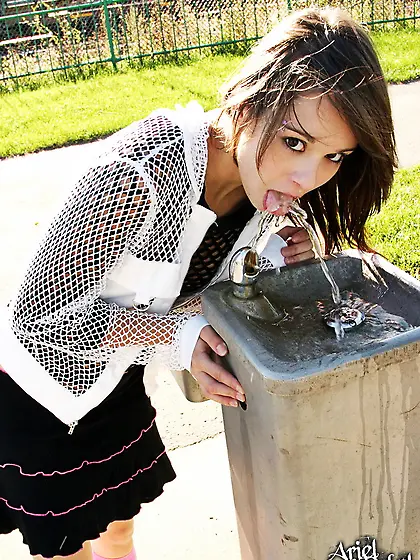 Ariel Rebel posing in her cute uniform and shows her nasty and s