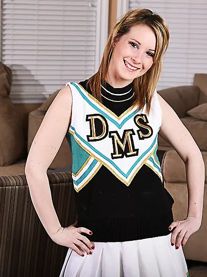 Shaved teen Tweety Valentine removes her cheerleader uniform and