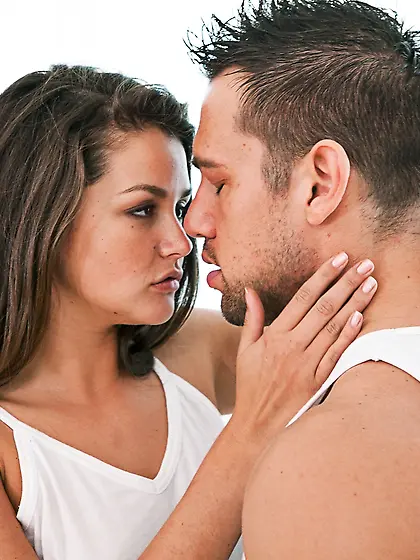 Pornstar fools around with an athletic man who licks her feet an