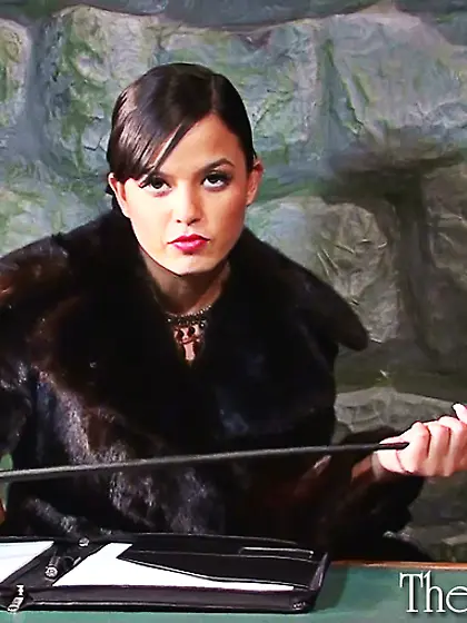 Dirty ponytailed brunette changing