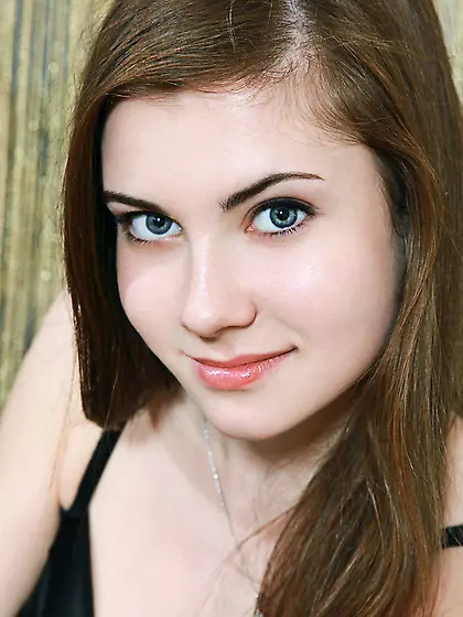 Dreamy young chick seductively