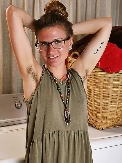 Small-tittied housewife with glasses climbs on washing machine t