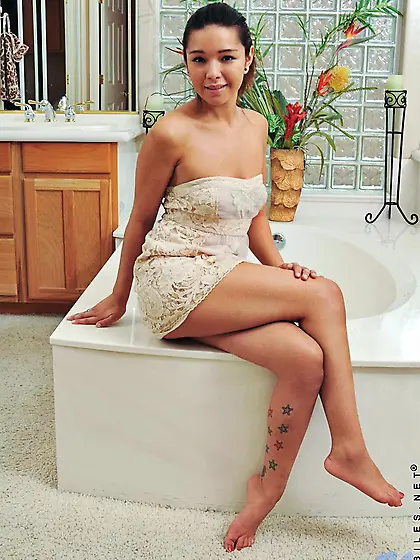 Sexiest teen Latino hottie Cali Doe gets in the hot tub and play