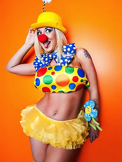 Sexy blonde colorful clown