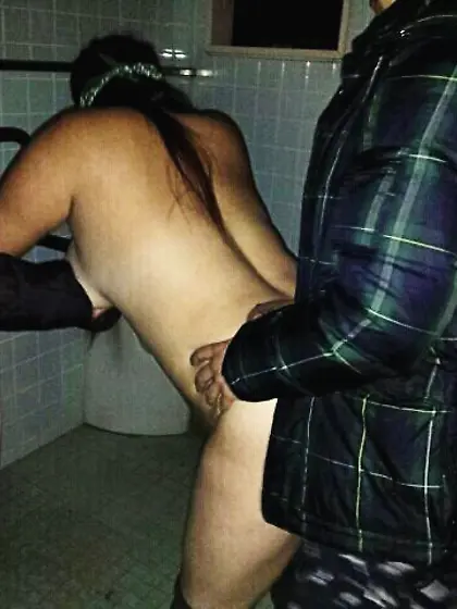 Women in men's public toilets