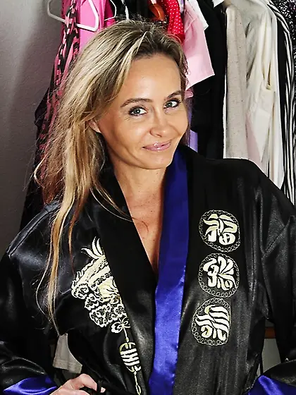 Cute mature babe strips