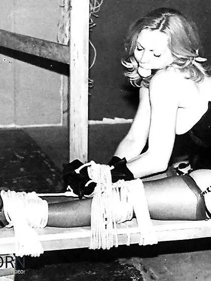 Vintage female being strapped down