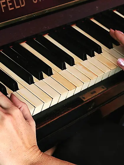 Long legged Nela Bony gets naked and shows off her smooth snatch