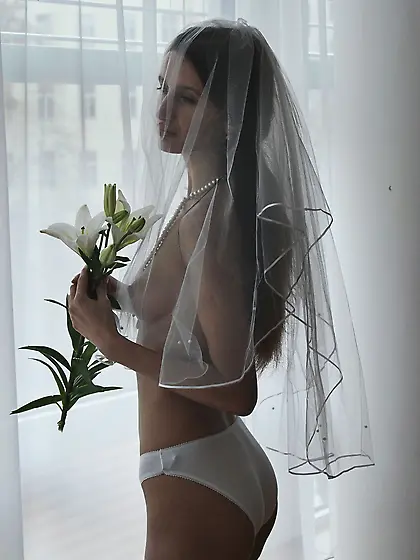 White stockings beautiful brunette bride shows her hairy pussy V