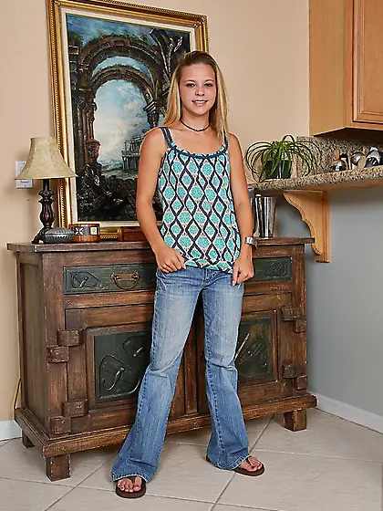 Petite blonde Destiny Garnet with tiny tits and bald pussy peels