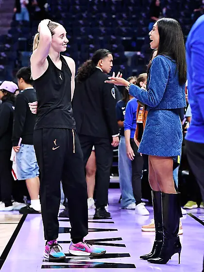 Kendra Andrews in a blue skirt