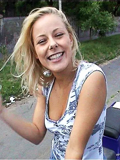 Mia Stone spreads her sexy legs on the bed and then toys her hun