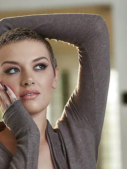 Short hair does not affect sexuality of young girl with charming