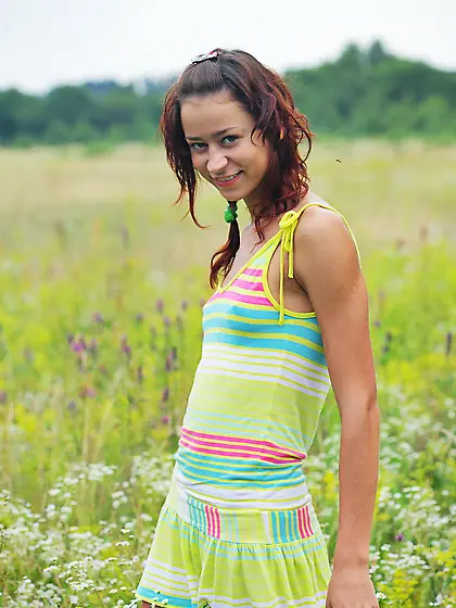 Nude teen in flowers