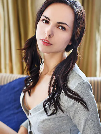 Brunette lady sexily poses