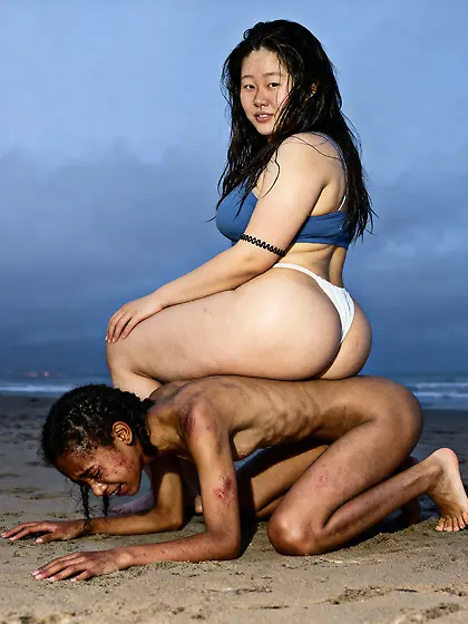 Big booty Asian sits on nigger