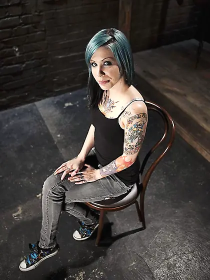 Torn jeans expose alt