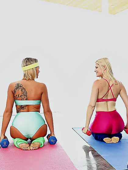 Tanned blonde tempts slender colleague into lesbian sex on yoga