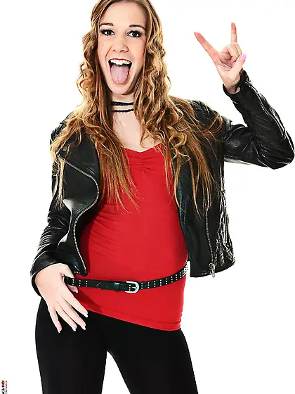 Brown haired chick Alexis Crystal is sexily taking off her leath