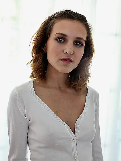 Cute teen chick Kasey Chase strips her mini skirt and shows her