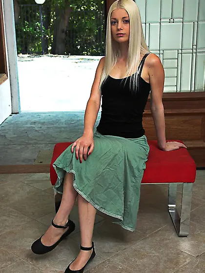 Slender blonde babe Charlotte Stokely strips naked and demonstra