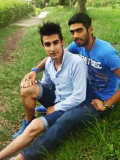 Young Man and Brunette Young Man Nacho.