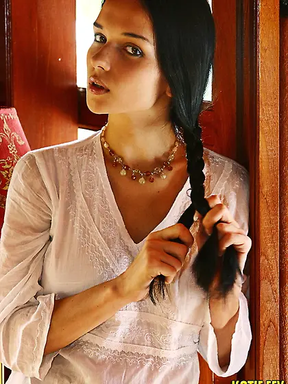 Cute and seductive brunette Katie Fey takes off her white shirt