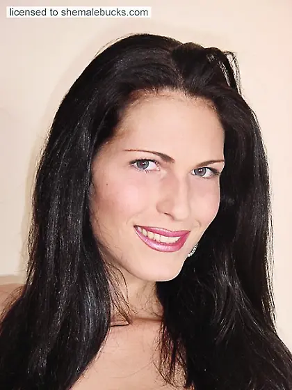 Shemale strips her evening dress & jacks off