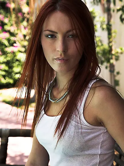 Redhead babe Alexandra Ivy with small tits and shaved snatch tak