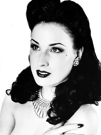 Dita Von Teese shows off the different black and white pictures