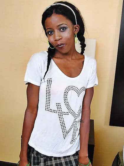 Petite Ebony starlet meets her first white dick after strips and