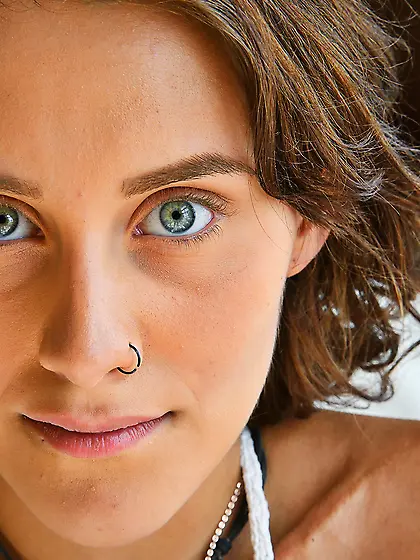 Short-haired babe shows her baby bump and lactating breasts too