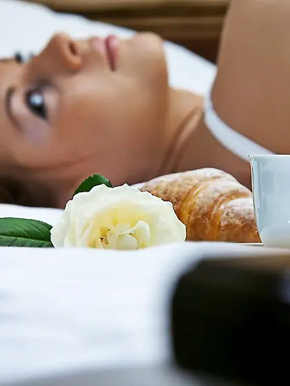 Tan lines blonde relaxing in bed and looking extra-hot while in