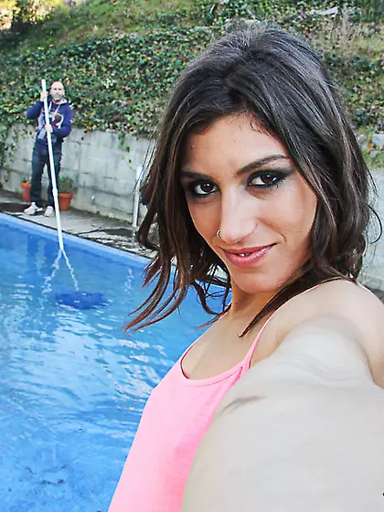 Antalizing brunette wearing coral