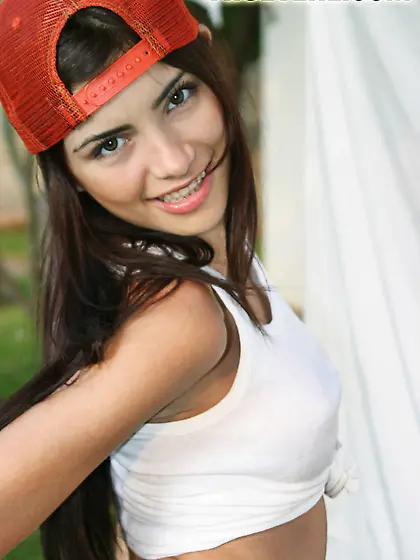 Seductive brunette model True Tere takes off her blue jeans and