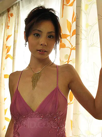 Sweet Asian Natsumi Mitsu puts on sleazy stockings and gets torn