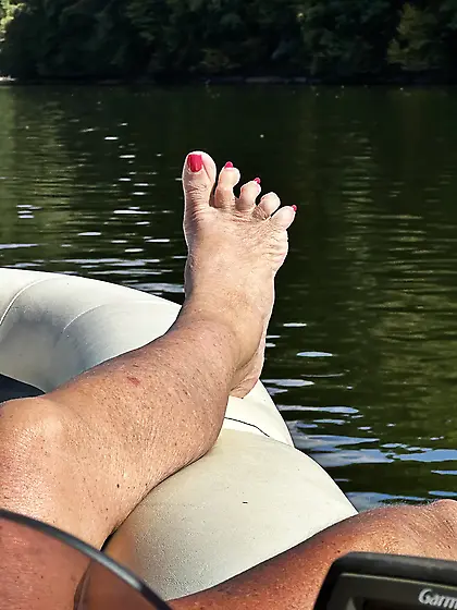 Feet on a boat