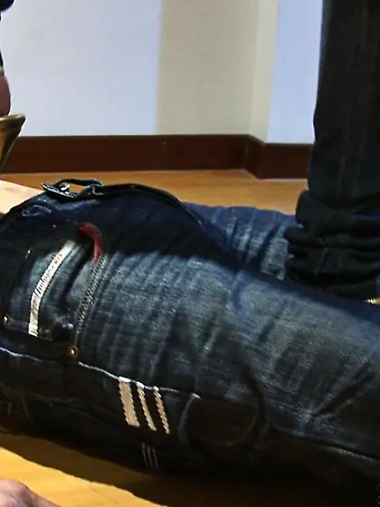 Exciting footjob given by sexy raven-haired...